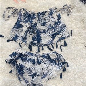 Vintage Havana printed two piece set.  Strapless design and tassel accents.